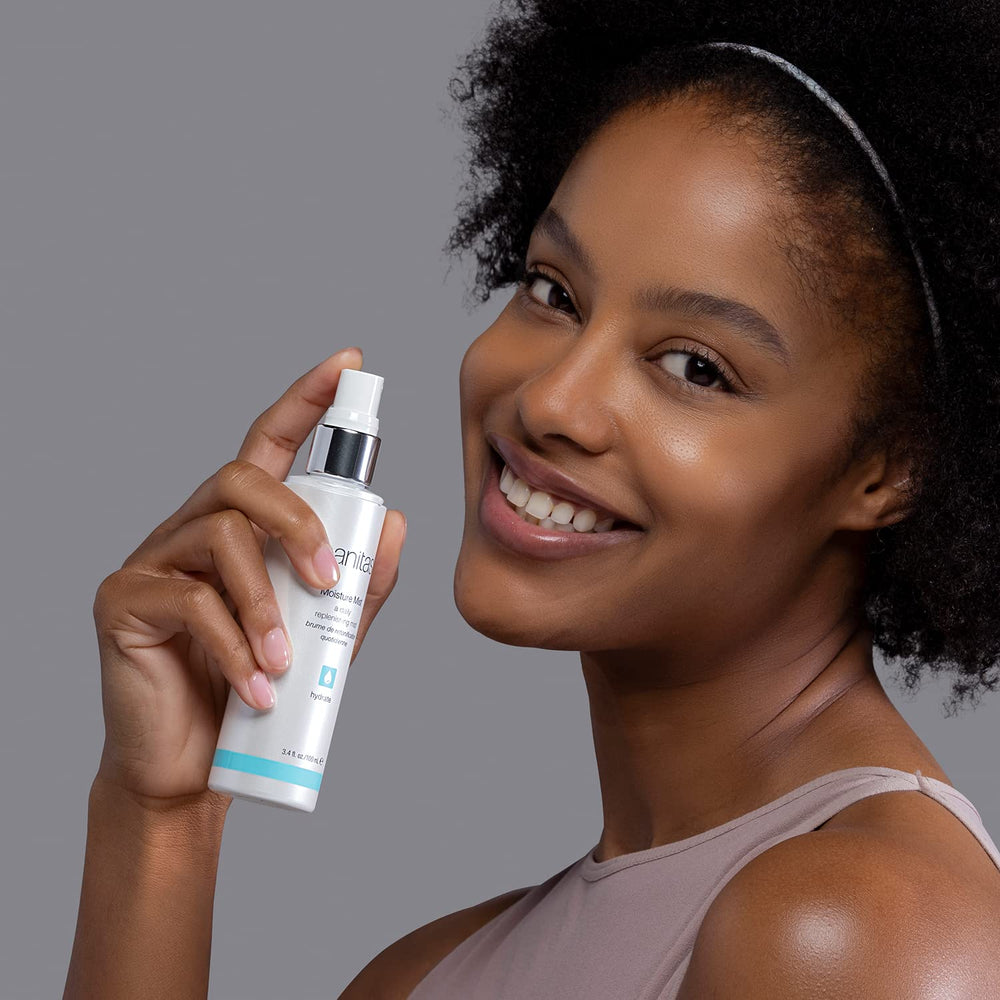 Sanitas Moisture Mist application on cheek shows light, even hydration