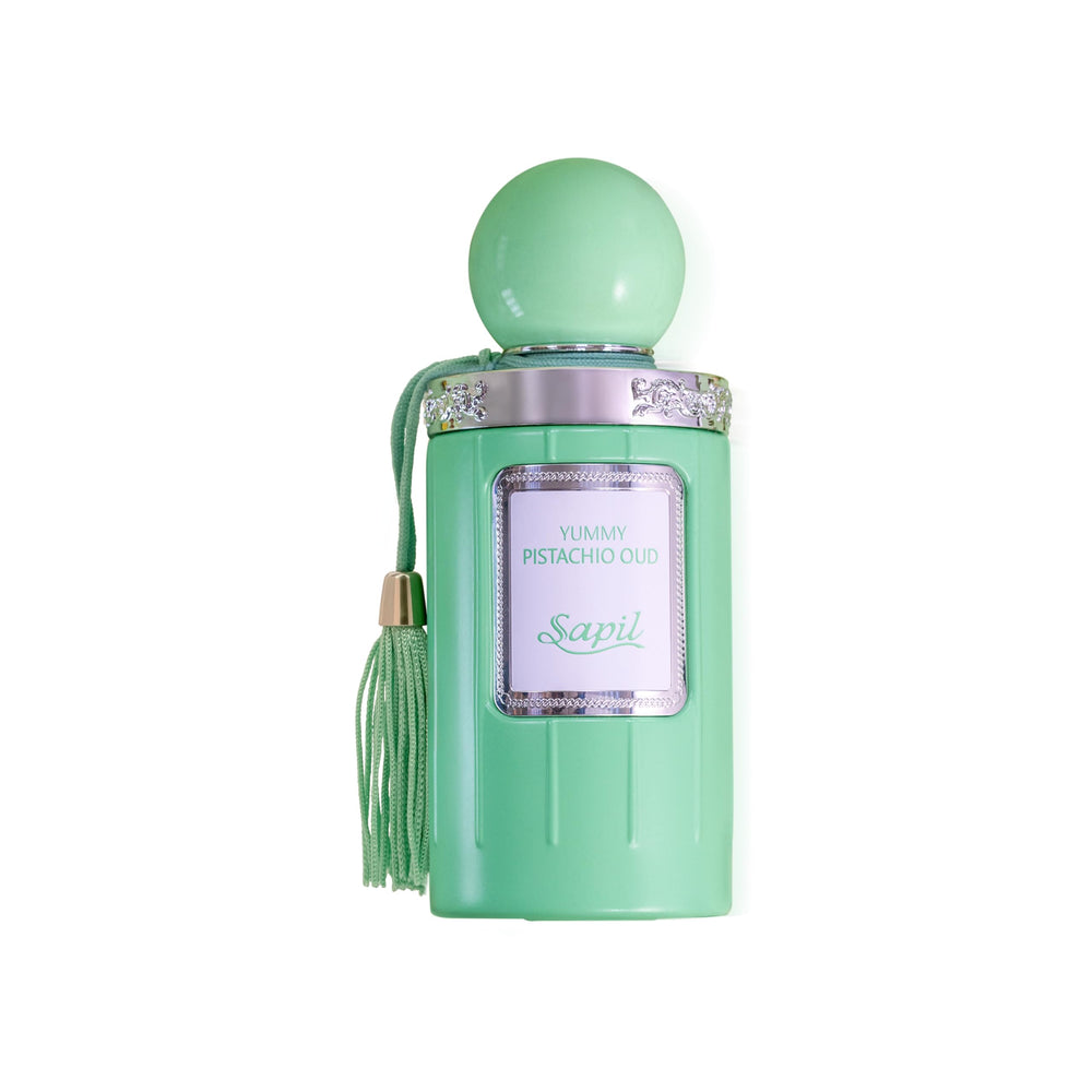 Sapil Yummy Pistachio Oud bottle front showing cream-gold label for everyday wear