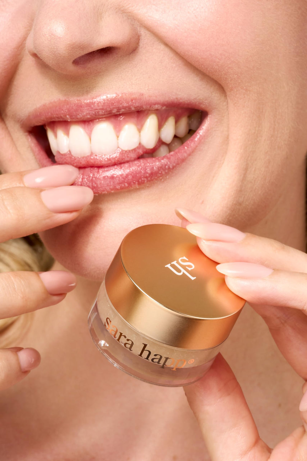 Sara Happ lip scrub packaging highlights vegan formula and nourishing oils