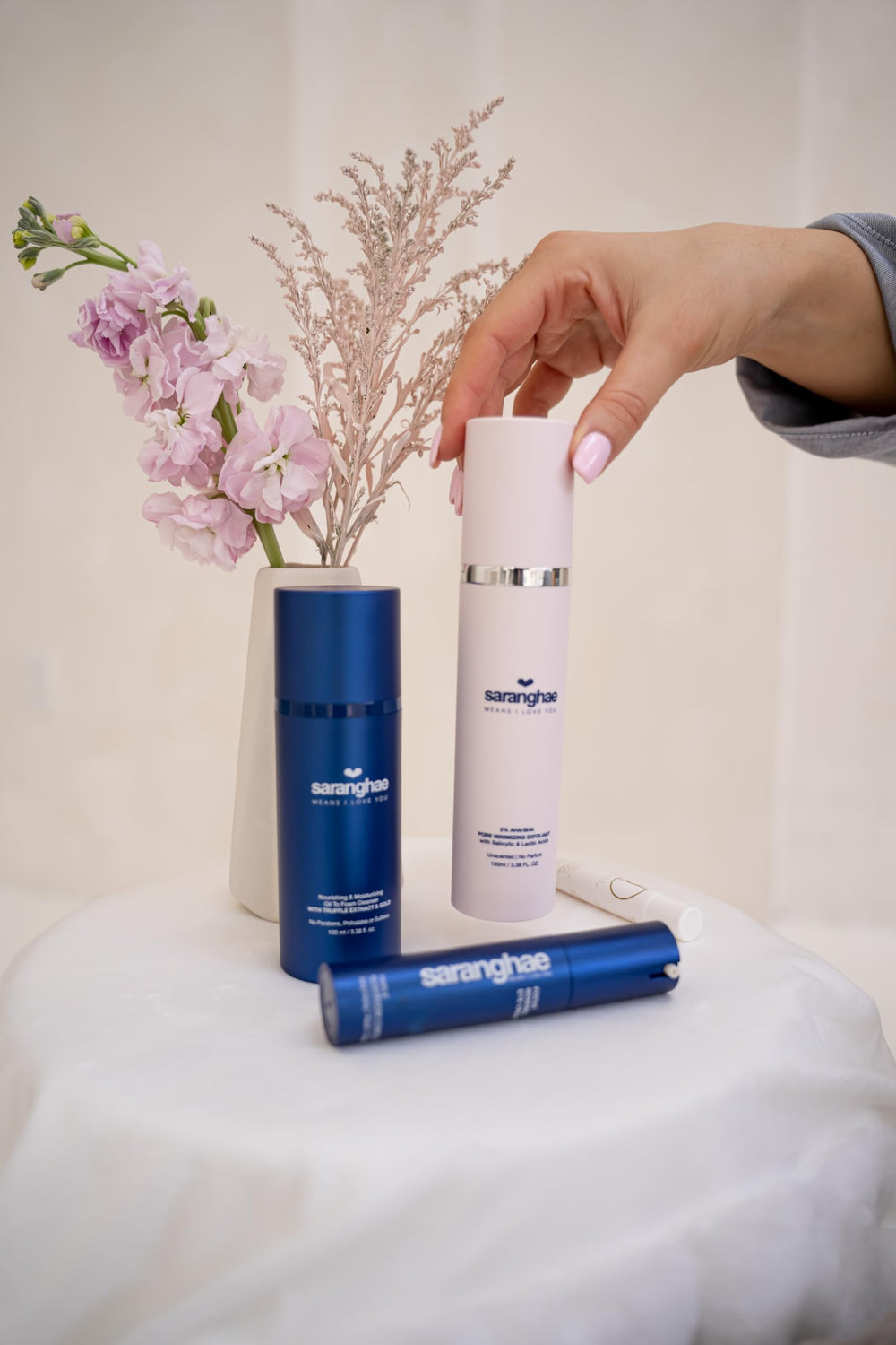 Saranghae Calm & Glow snail mucin serum-application-closeup showing easy absorption.