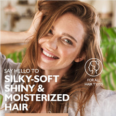Saryna Key Repair Oil frizz-control on strands for smoother styling