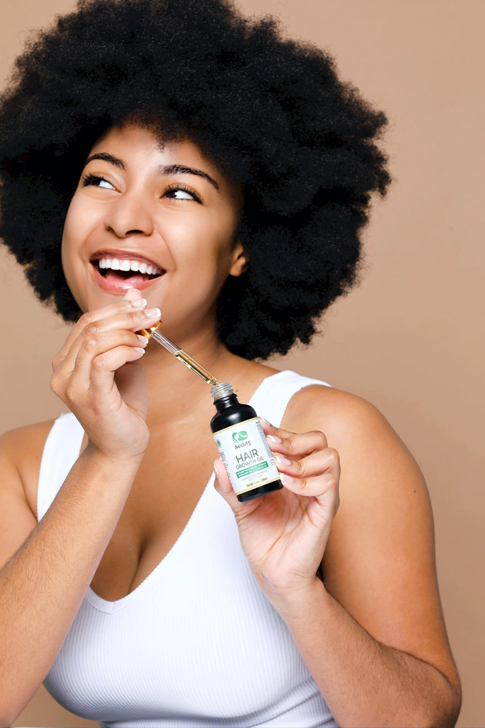 Seddy Hair Growth Oil on hair showing improved manageability