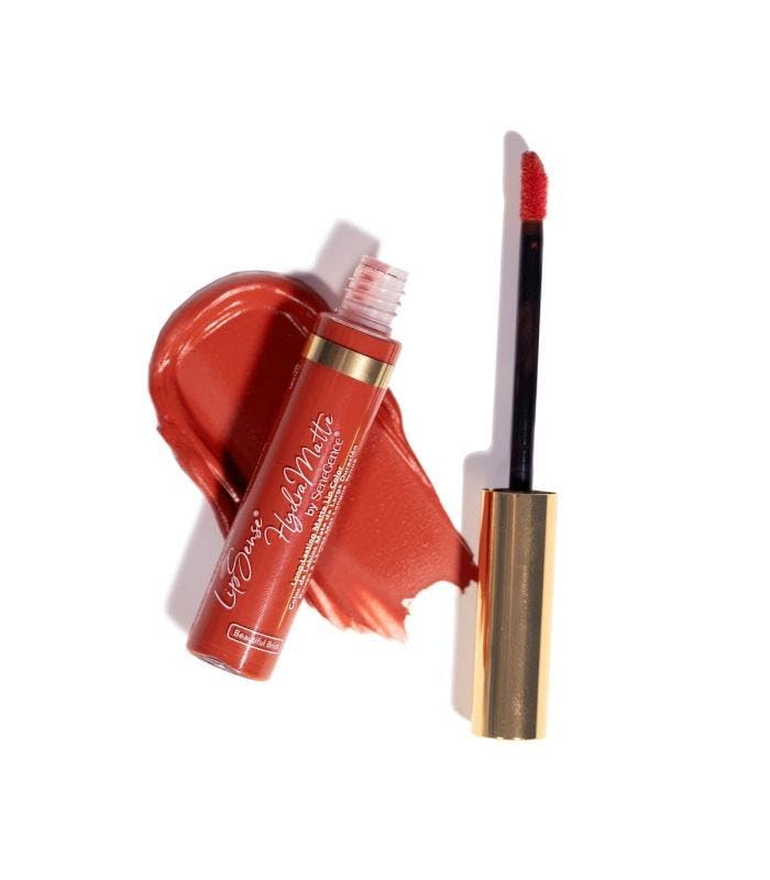 Senegence LipSense HydraMat application shows effortless one-swipe color.