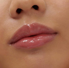 Sephora Collection Cherry lip sleeping mask on nightstand for overnight hydration.