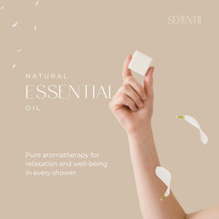 Serentii Orange Blossom shower steamer dissolving in steam for lasting fragrance.