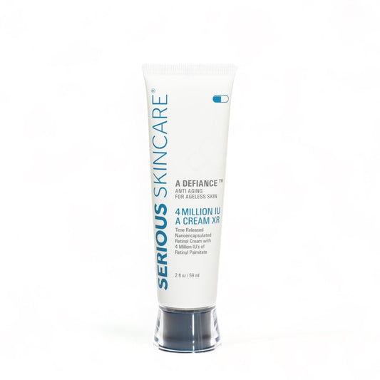 Serious Skincare Retinol Cream tube close-up showing smooth texture for radiant skin.