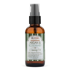 Shea Terra Argan & Rosemary cleansing oil bottle pour for deep pore cleansing and refreshing skin.
