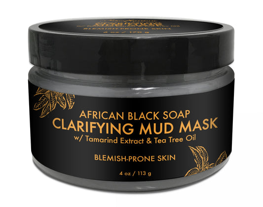 Sheamoisture African Black Soap Mask application demonstrates purifying action for troubled skin.