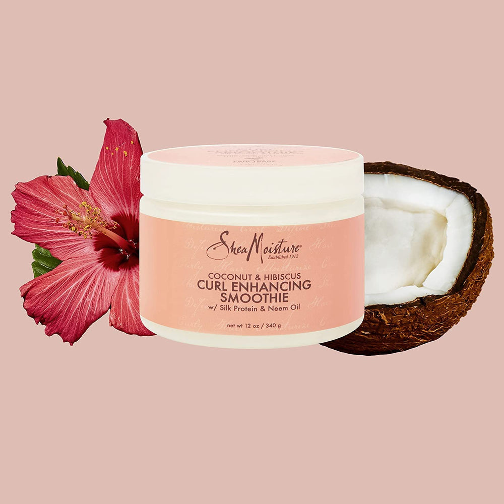 Sheamoisture Smoothie applied to hair ends for frizz control and smoother texture.