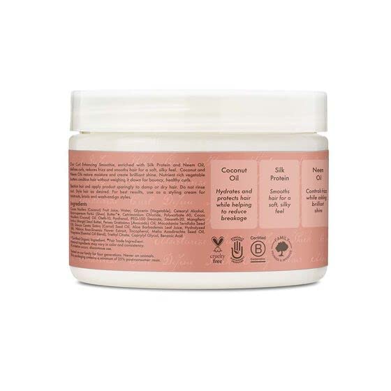 Sheamoisture Coconut & Hibiscus Curl Enhancing Smoothie being applied to hair for moisture and shine.
