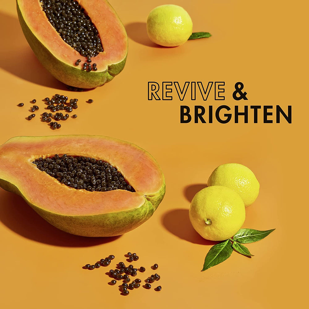 Drop from SheaMoisture Papaya Vitamin C Serum bottle for controlled daily application.