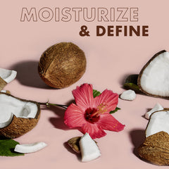 Twist-out styling application using SheaMoisture curl smoothie for even distribution.