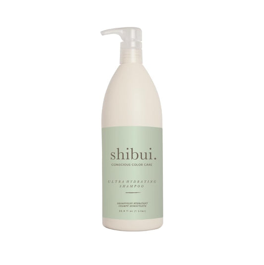 SHIBUI Ultra Hydrating Shampoo bottle pour shows moisture-rich cleanse for color-treated hair.