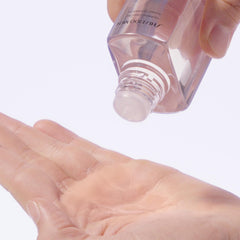 Close-up of Shiseido Men Hydrating Lotion Clear texture with light, non-greasy feel.