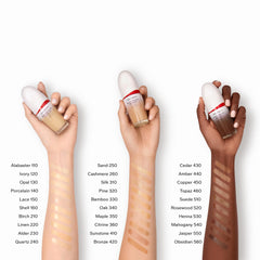 Foundation application with brush for smooth, seamless blend using Shiseido RevitalEssence.
