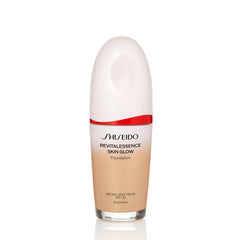 Shiseido RevitalEssence Skin Glow Foundation bottle reveals a luminous, long-wearing finish for all-day radiance.