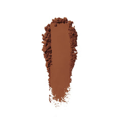 Shiseido Synchro Skin powder foundation swatch demonstrating buildable sheer-to-medium coverage.