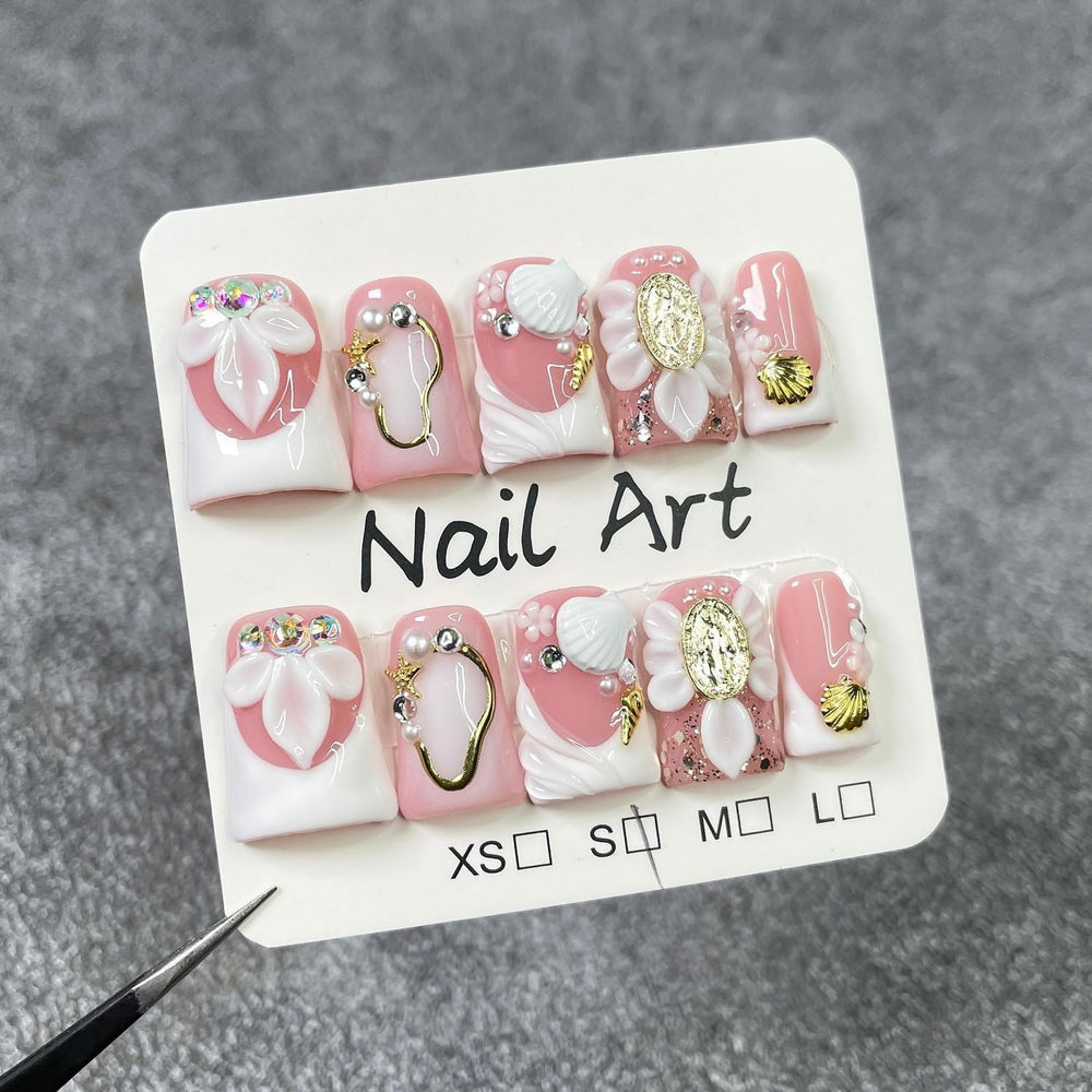 Close-up of white French tip on Short Duck nails for chic style