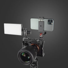 SIOTI cold shoe closeup with accessory demonstrating easy mic or light attachment