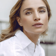 Texture close-up shows light glide-on finish for bare-skin feel.