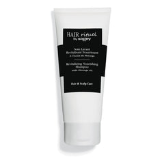 Sisley Paris Revitalizing Nourishing Shampoo bottle close-up for nourishing care