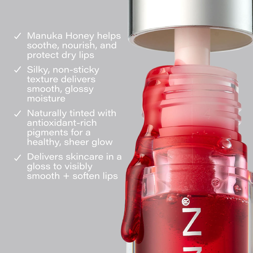 Close-up shows smooth lip texture with Vitamin C glow from the tint.