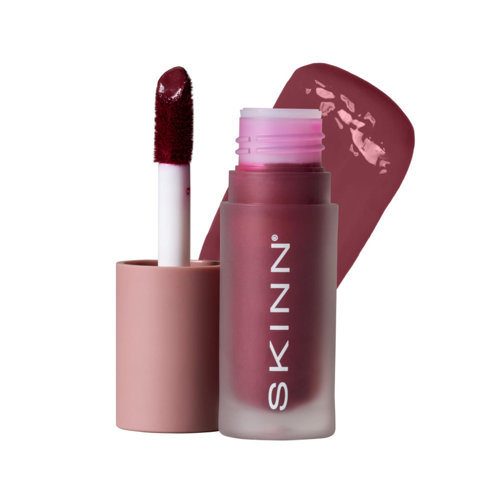 SKINN Treatment Liquid Blush Berry bottle highlights vibrant color with lightweight wear.