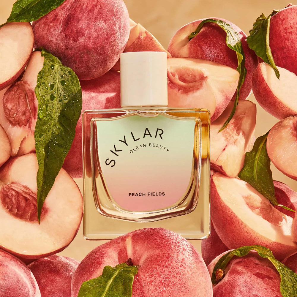 Top notes visual: mandarin, grapefruit, white peach opening.