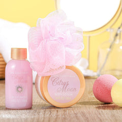 Spa Luxetique body lotion bottle nourishes skin with soft hydration.