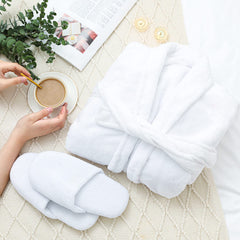 Spa Luxetique spa slippers featuring non-slip soles for indoor comfort.