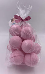 Spa Pure Juicee Couture Fizzies in a serene bath scene promoting relaxation.