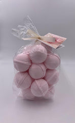 Spa Pure Pink Sugar Bath Bomb packaging with hang tag and ribbon, a thoughtful gift.