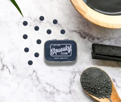 SqueakyClean orange tablet in tin for a refreshing citrus hand wash