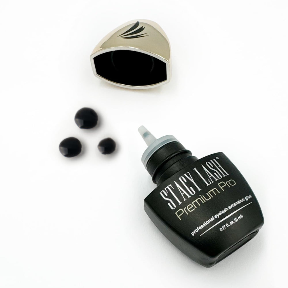 STACY LASH Premium Pro glue on glossy surface implies reliable bonding for long-lasting lashes.