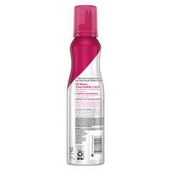 Close up of whipped mousse texture showing velvety consistency for soft curls
