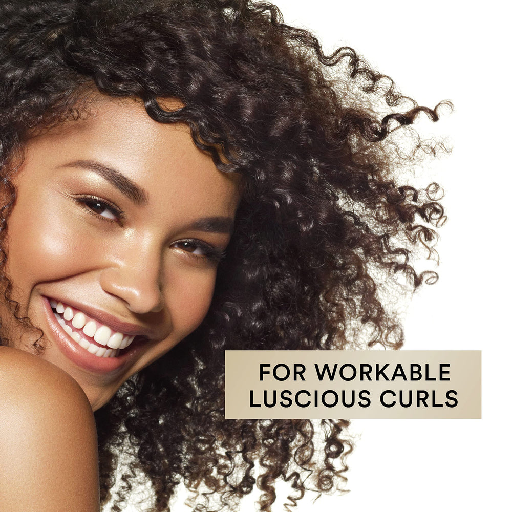 Suave Luscious Curls soft shine on curls after conditioning.