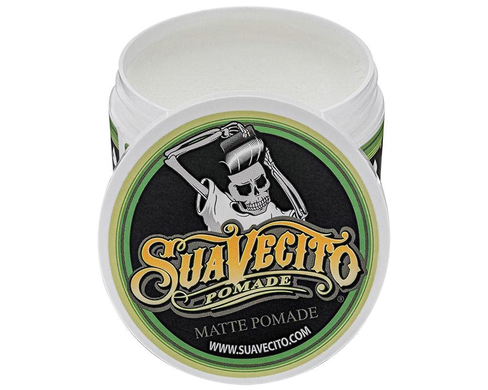Applying Suavecito Matte Pomade for even distribution and easy styling
