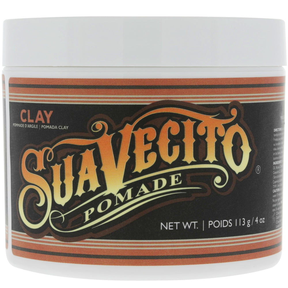 Fingers sculpt Suavecito Pomade Firme Clay for precise lines
