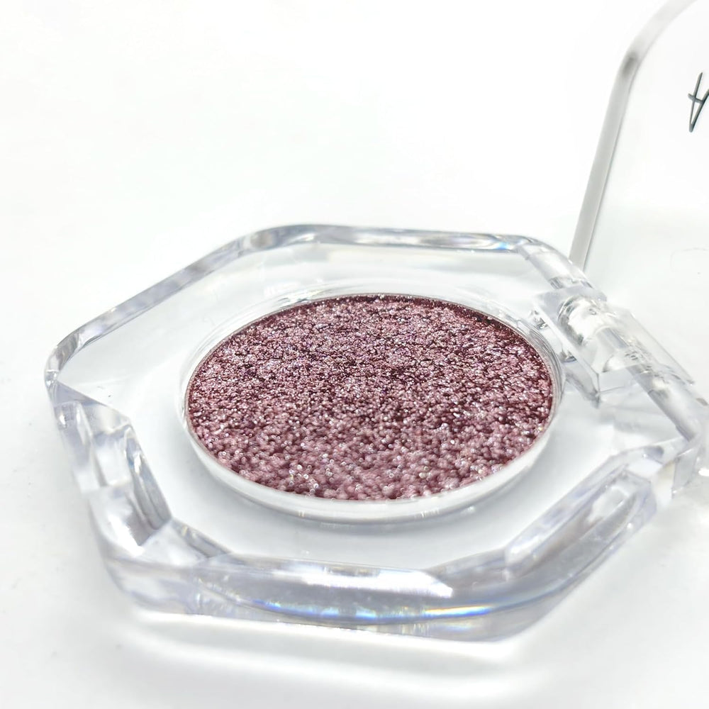 Sudxin Adriana Nicole Ethereal eyeshadow ideal for travel due to color-shifting shimmer.