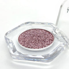 Sudxin Adriana Nicole Ethereal eyeshadow ideal for travel due to color-shifting shimmer.