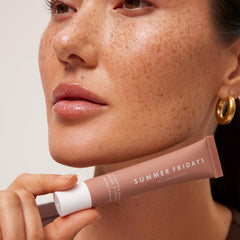 Summer Fridays Lip Balm in use for moisture.