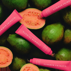 Guava-scented conditioning from Summer Fridays Pink Guava lip balm on lips.