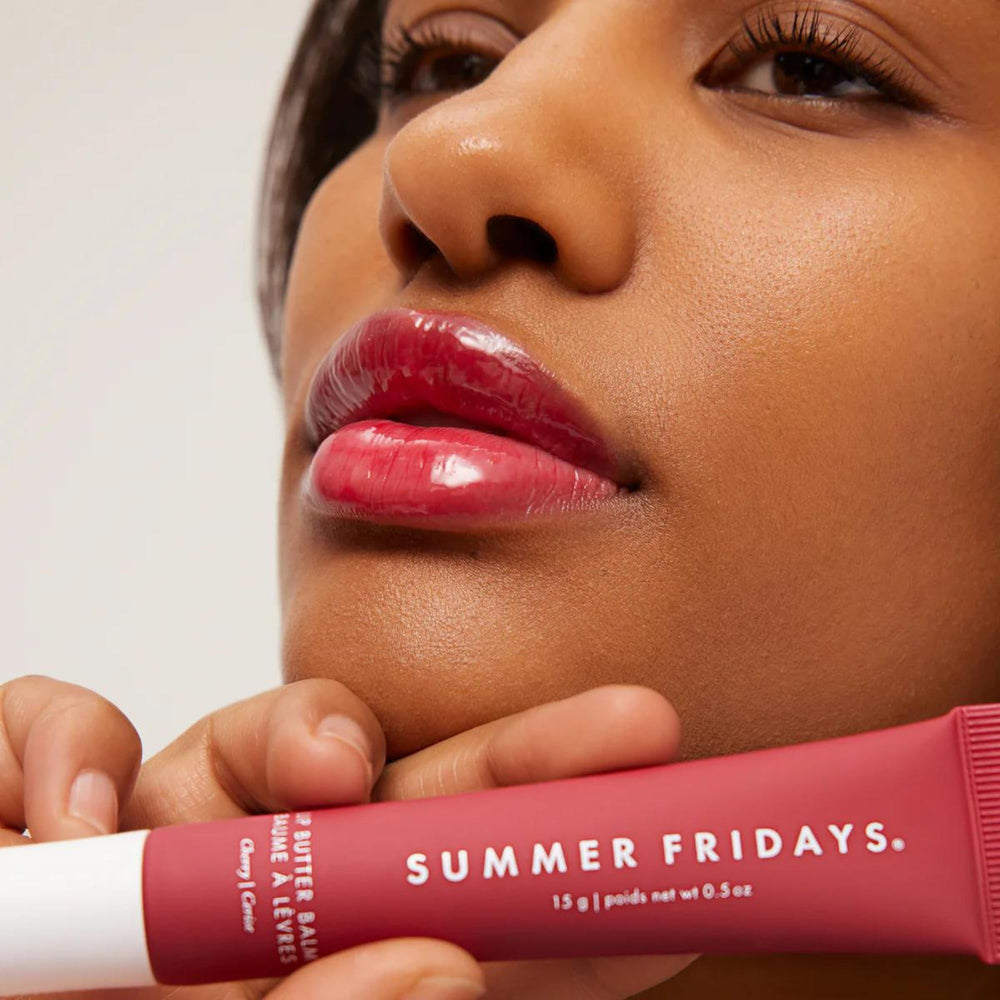 Summer Fridays lip butter on finger shows easy glide and non-greasy finish.