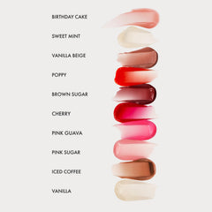 Application shot of Summer Fridays lip balm over lipstick for added shine.