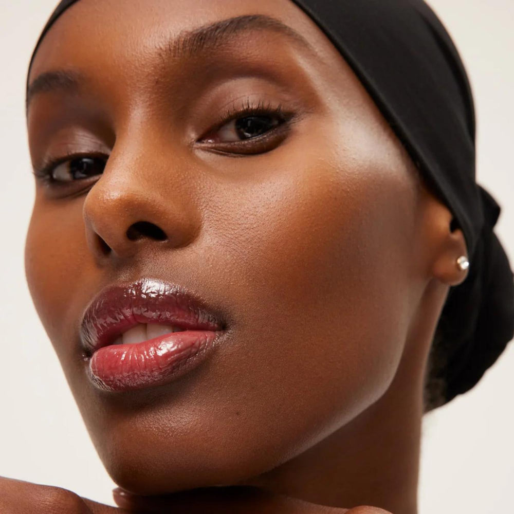 Summer Fridays Brown Sugar vegan lip balm formula shot highlighting clean vegan waxes.