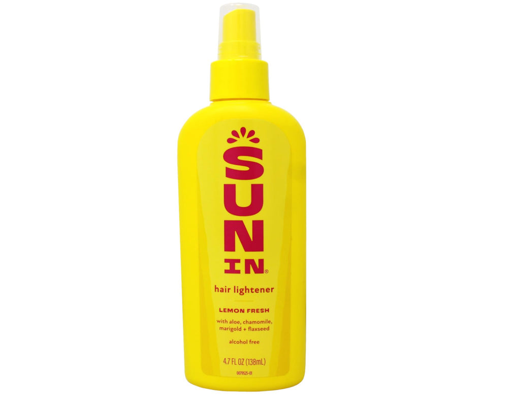 Sun-In hair lightener outdoors uses warmth to brighten natural highlights.