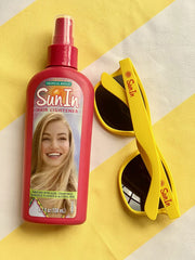 Brunette with sun-kissed glow after using Sun-In Original Spray-In Lightener