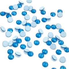 Sun Tangerine Swarovski 2088 Xirius Electric Blue flat backs for long-lasting nail art shine.