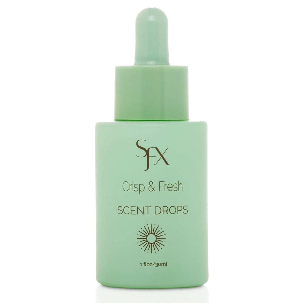 SunFX Scent Drops bottle pour for a refreshing tanning aroma.