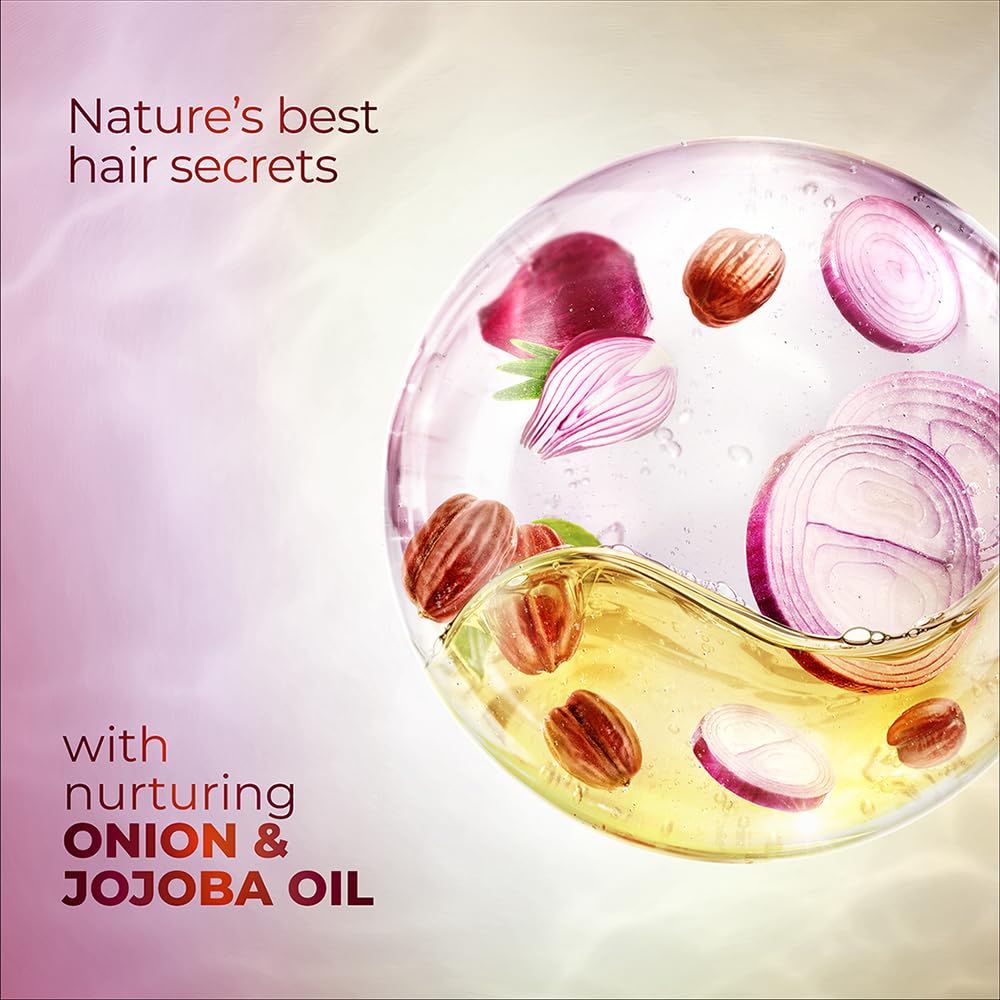 Sunsilk Onion & Jojoba pour action capturing smooth distribution.